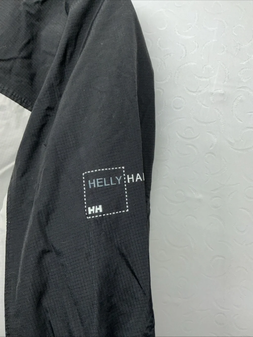 Helly Hansen Black, White & Teal Ski Jacket